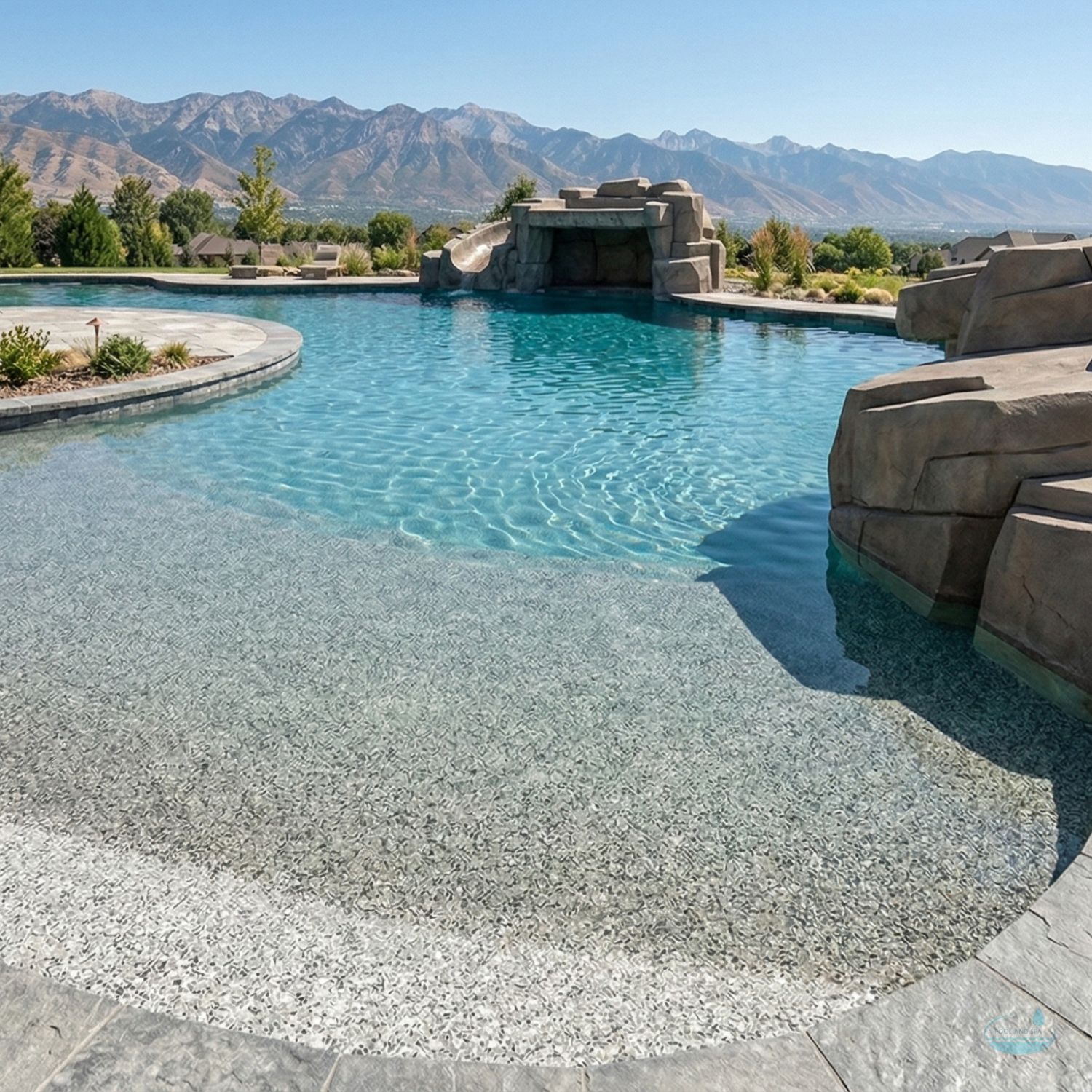 Freeform Pools with Lagoon Inspired Features That Elevate Your Backyard